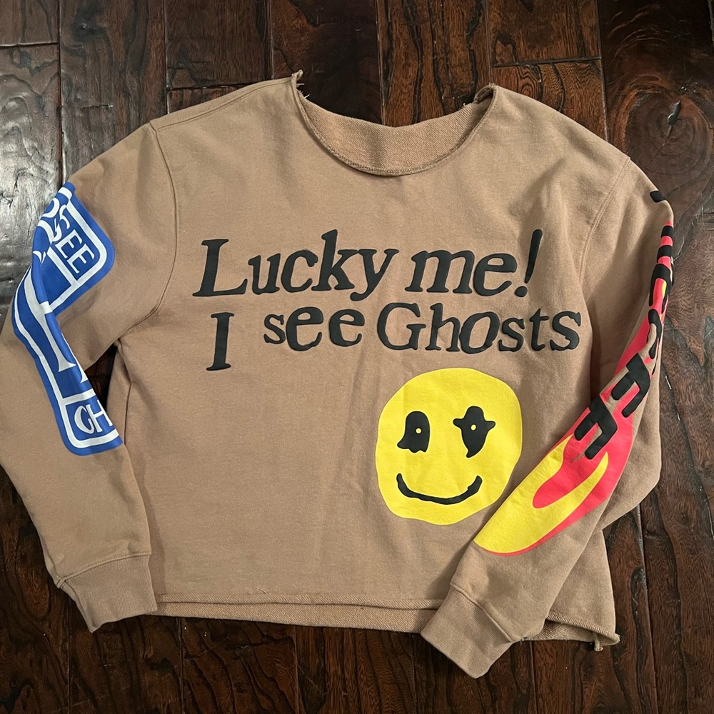 Lucky me I see Ghost sweatshirt. Has been cropped. Brown color. Size large.